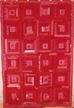 $Log Cabin Red Allover with embroided centers .jpg