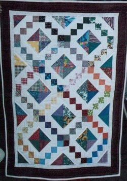 $Tsunami Jewel Box Baby Quilt.jpg