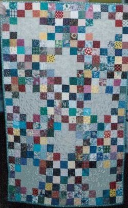 $Tsunami Triple Irish Chain Scrap Baby Quilt.jpg