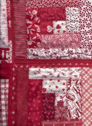 $feather stitch detail added to red quilt blocks.jpg