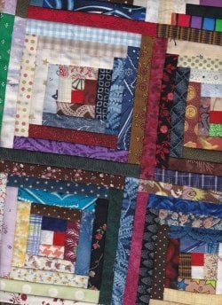 $Log Cabin Star4 With Postage Stamp Border Quilt.jpg