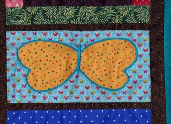 $Glad Rag Quilt - Goldl lantern butterfly.jpg