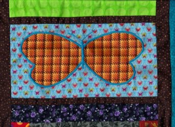 $Glad Rags and Longwings Quilt, Satin stitches6.jpg