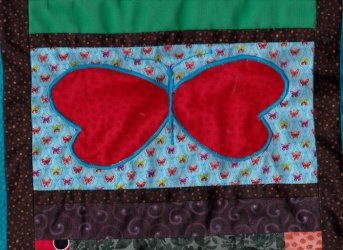 $Glad Rags and Longwings Quilt, Satin stitches8.jpg