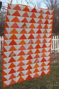 $03 Orange flying geese quilt.jpg