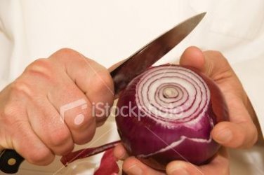 $stock-photo-5464731-hands-of-a-cook-peeling-an-onion.jpg