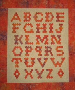 $Orange alphabet flower garden quilt.jpg