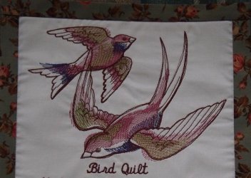 $1 Allie emb bird-quilt.jpg