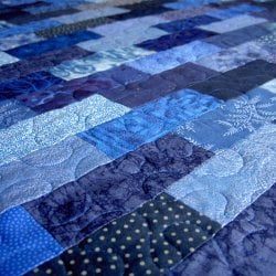 $ScrappyBlueStackedBricksBabyQuilt.jpg