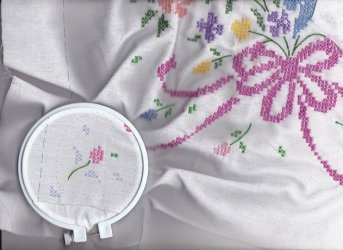 $Practice floral X-stitch hoop with flag on edge.jpg