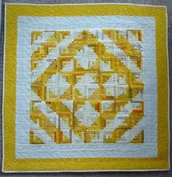 $yellow log cabin quilt 2.JPG