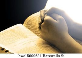 hands-praying-on-bible_bwc15000631.jpg